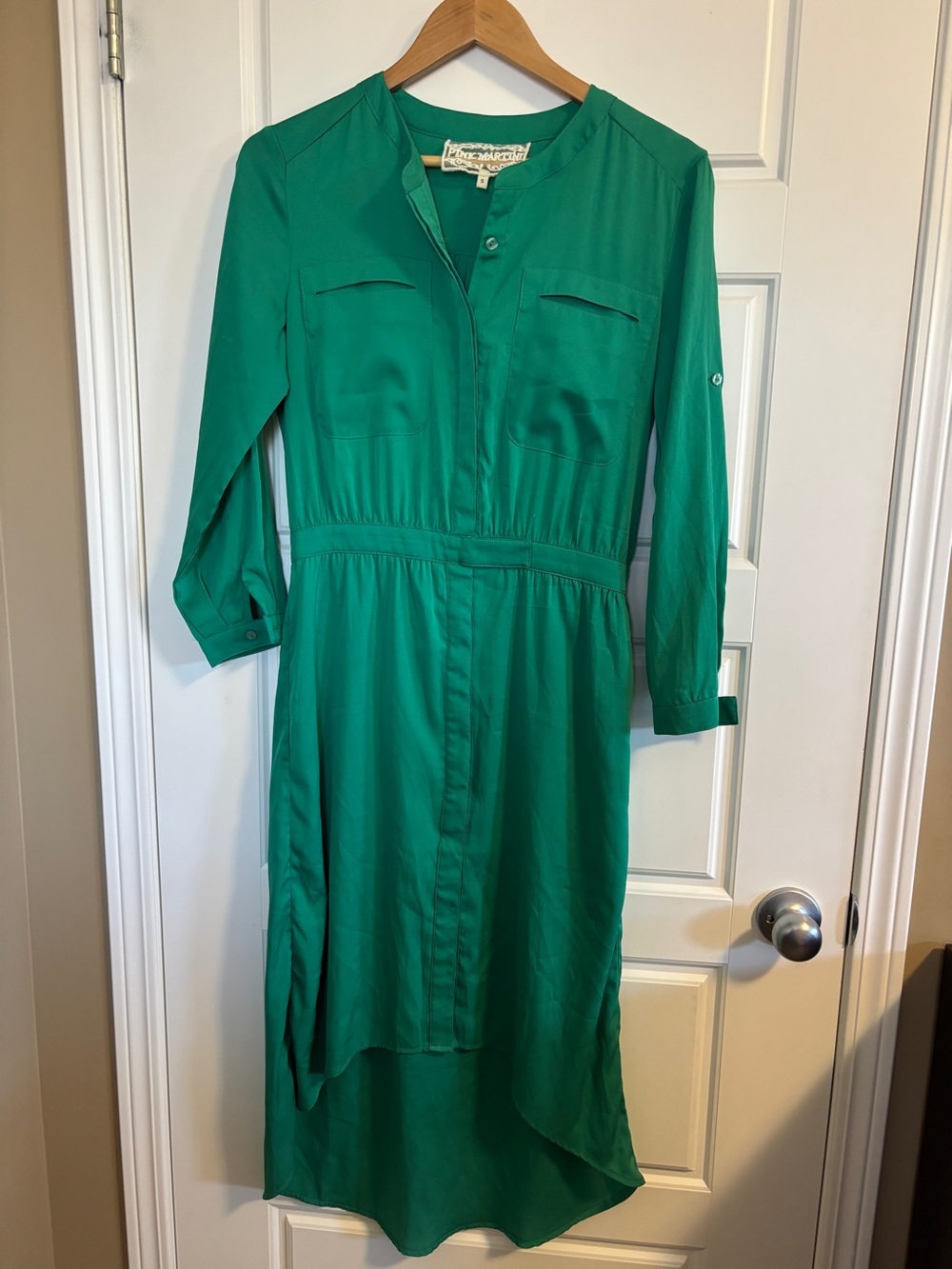 Vibrant emerald green shirt dress by the brand Pink Martini Collection.